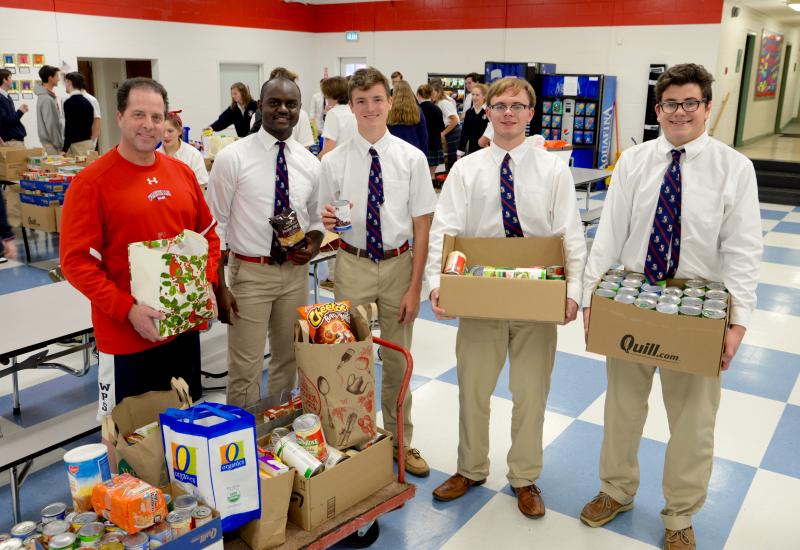 Worcester Prep Head of Upper School Mike Grosso is shown with SGA officers (l-r) Henry Taboh, Dakin Moore, Sam Cantor and Basil Christian.